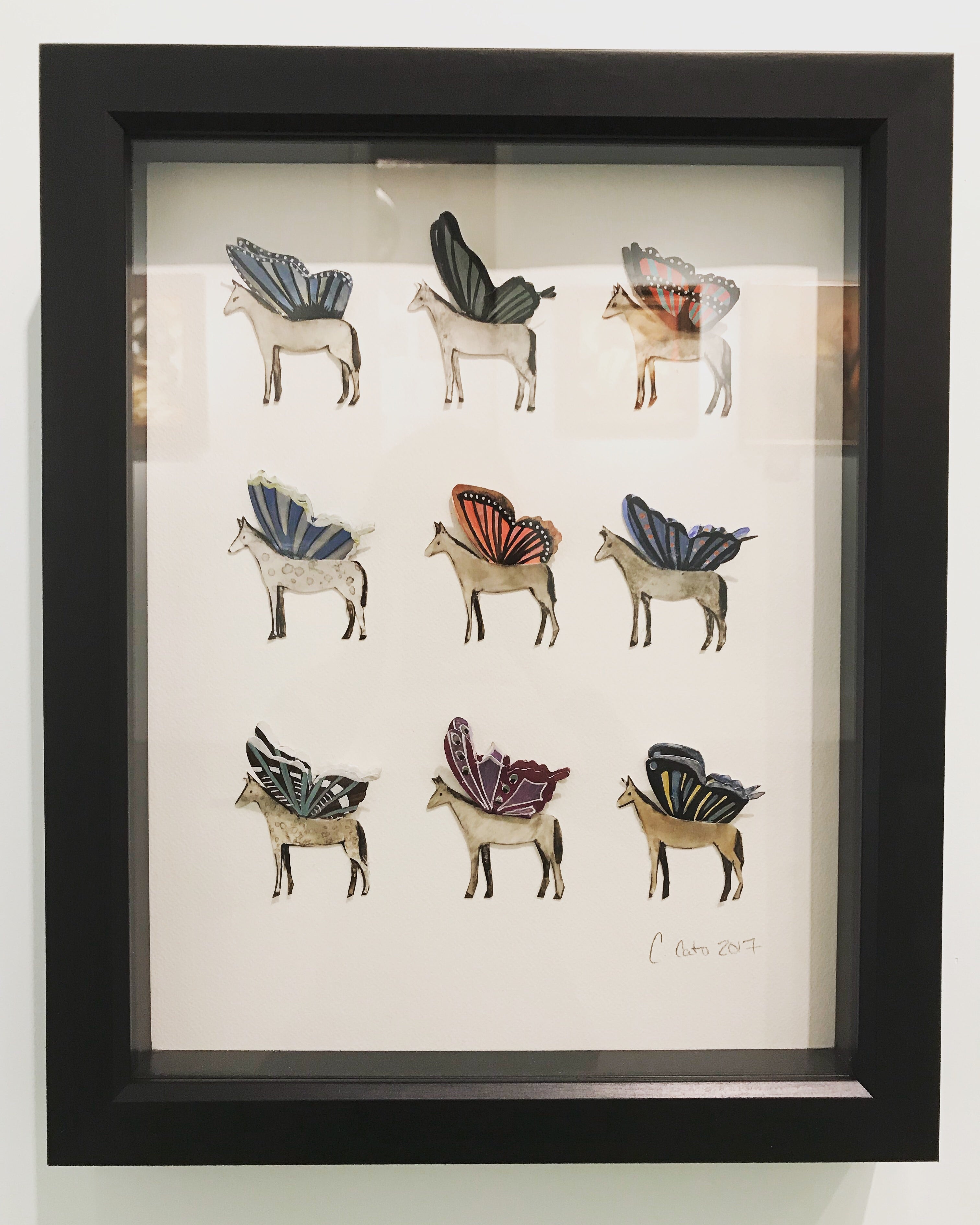 Horses with butterfly wings in a shadow box by Candace Cato