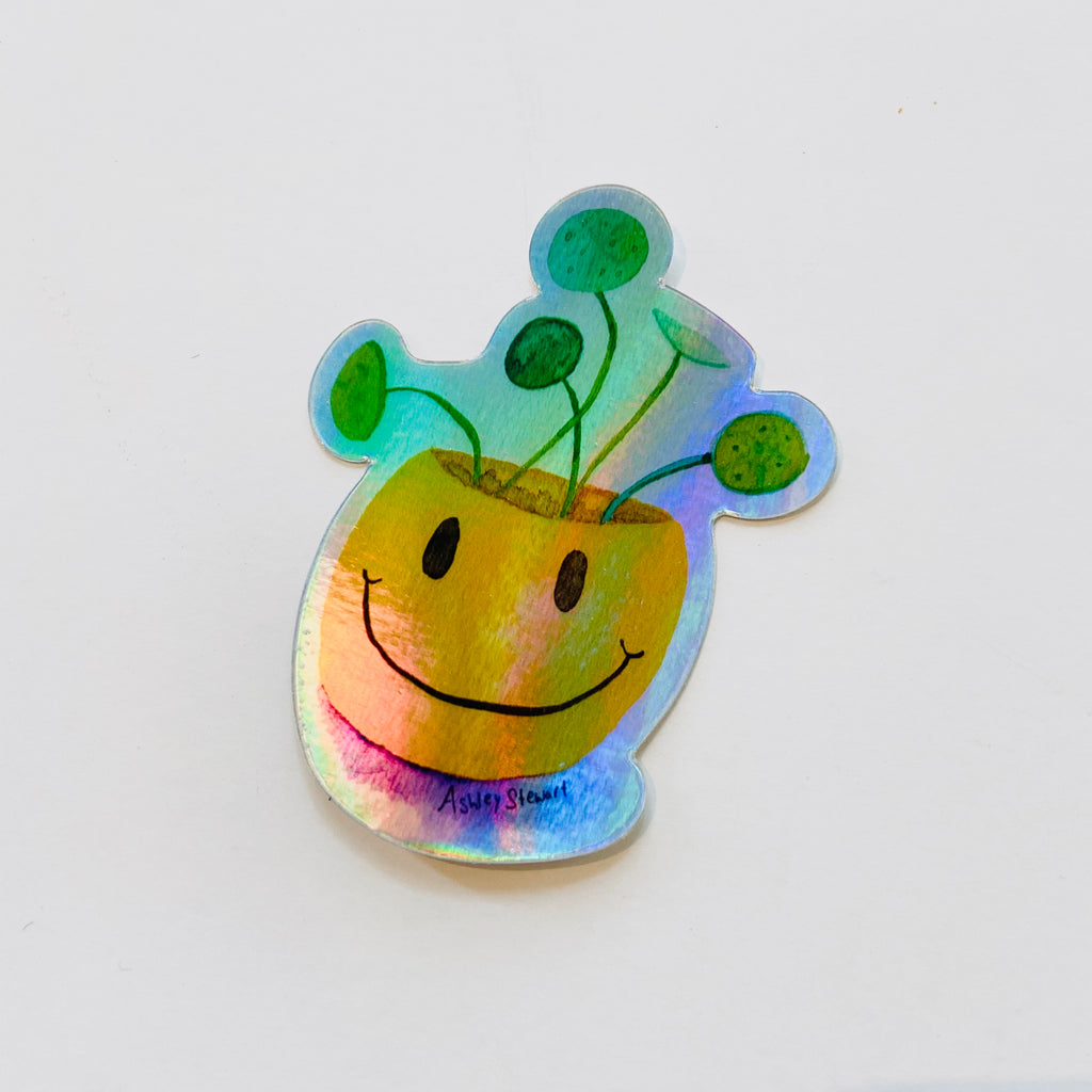 smiley face planter with plant holographic sticker